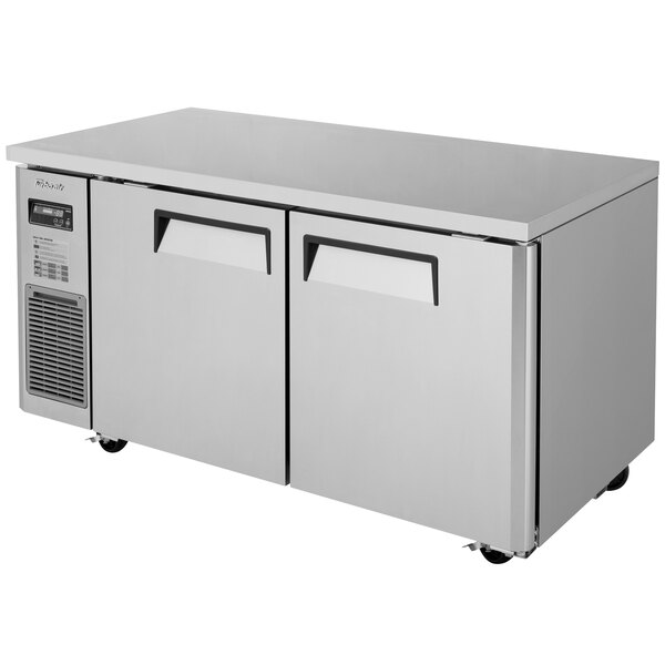 A stainless steel Turbo Air undercounter freezer with two doors.