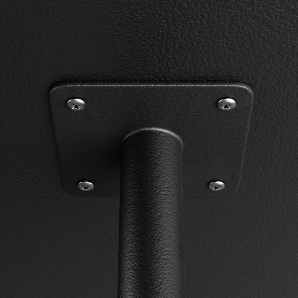 A black metal FLAT Tech pin leg with silver screws.