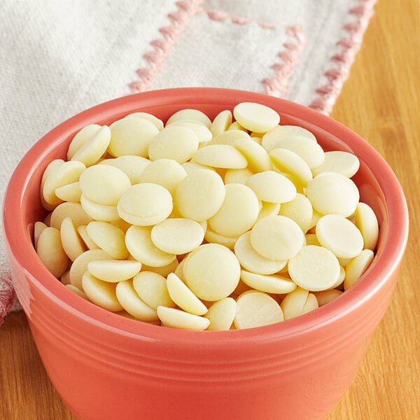 A bowl of Callebaut white chocolate chips.