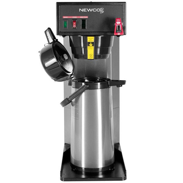 A Newco airpot coffee brewer with a cup holder.