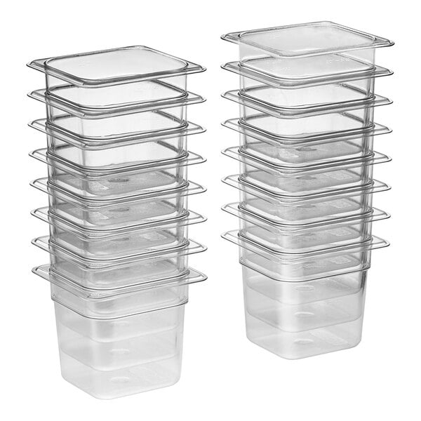 A stack of six clear Vigor polycarbonate food pans.