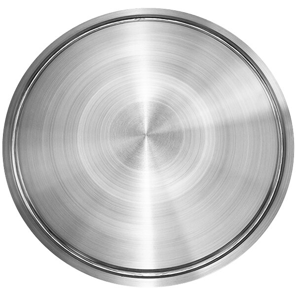 a close-up of a circular metal surface