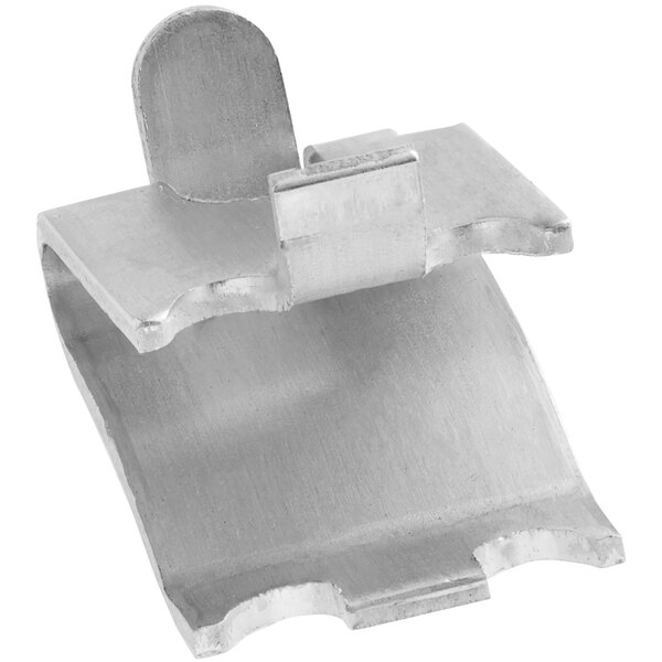 A close-up of a stainless steel shelf clip.