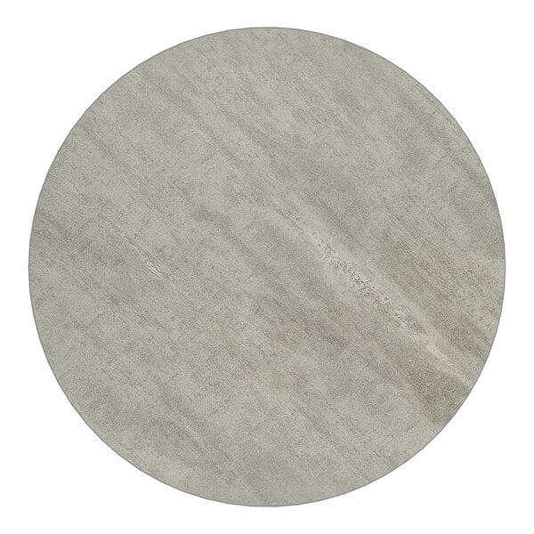 A round, reversible table top with a white and gray slate laminate finish.