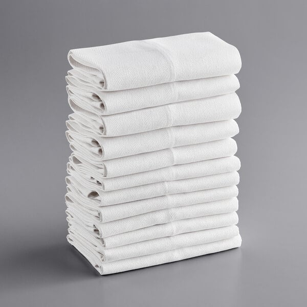 A stack of white folded Choice kitchen towels.
