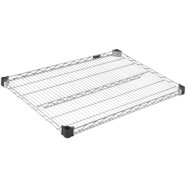 An Eagle Group Quad-Adjust wire shelf with a black mat.