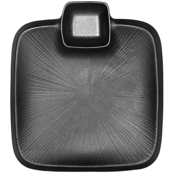 A black square Elite Global Solutions melamine chip and dip plate with a small cup.