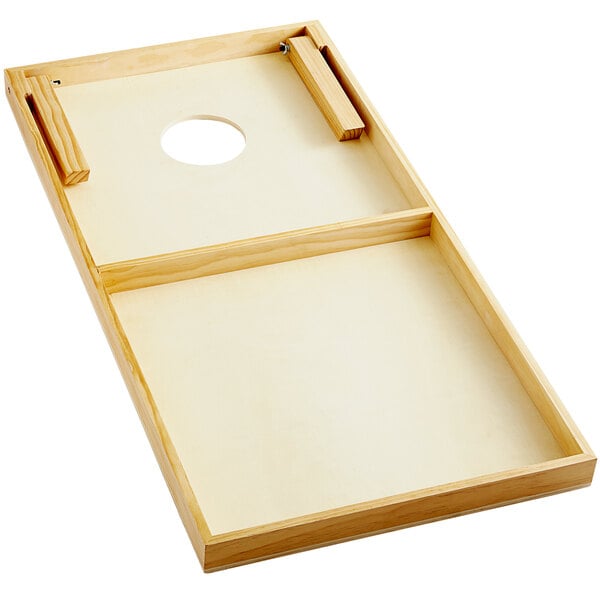 A Backyard Pro plain wood cornhole board with a hole in the center.
