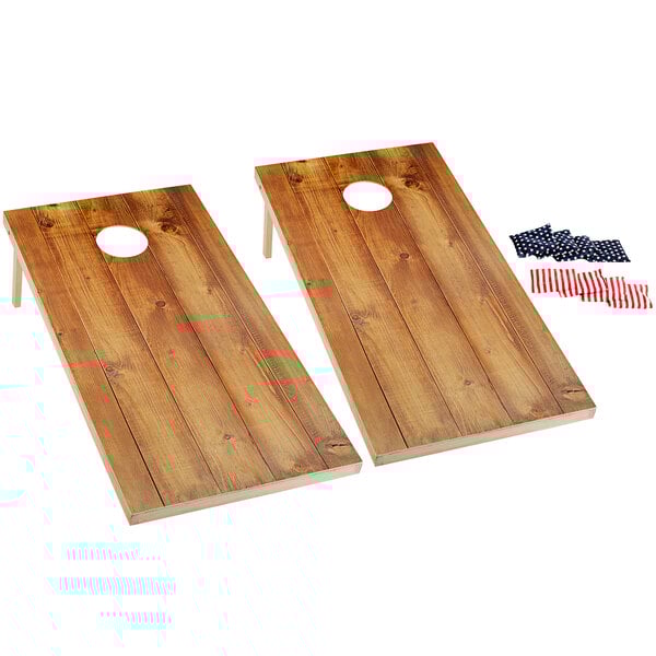 A Backyard Pro rosewood cornhole set with American flag designs on the boards.
