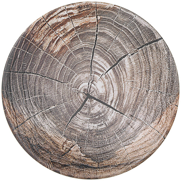 An Elite Global Solutions Denali Knotwood embossed melamine plate with a tree trunk design.