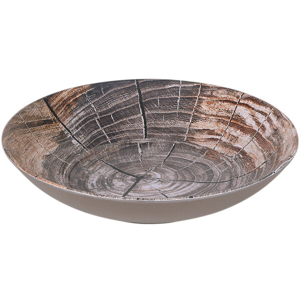 a bowl with a tree stump pattern