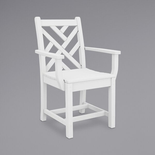 a white chair with armrests