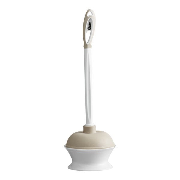 A white Quickie toilet plunger with a beige handle in a white caddy.