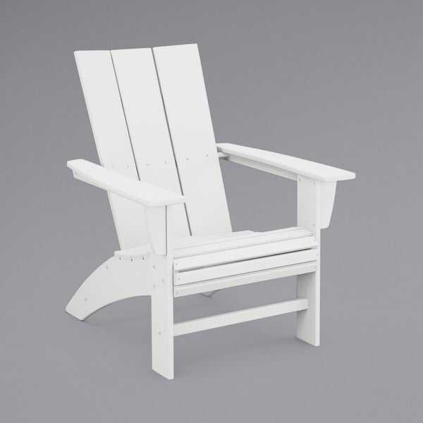 A white POLYWOOD Adirondack chair with armrests.
