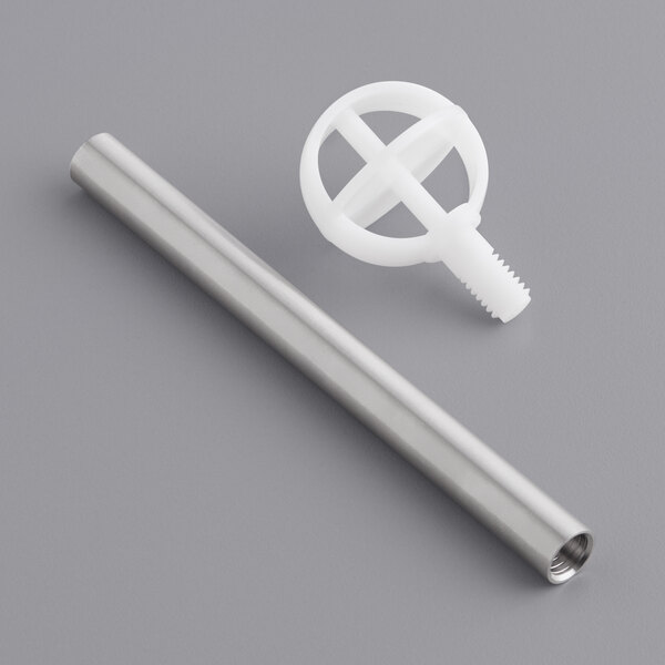 A metal tube with a white plastic agitator on top.