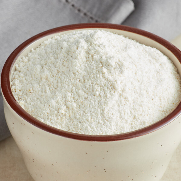 A bowl of White Lily self-rising cornmeal mix.