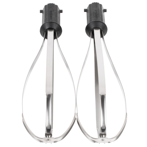 A pair of metal whisks with handles.