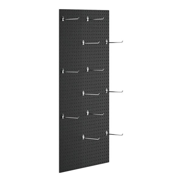 A close-up of a black Cambro Camshelving® pegboard with silver hooks.