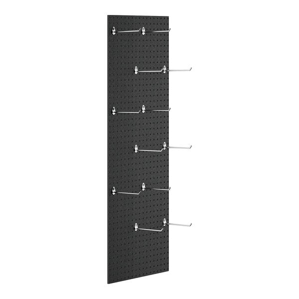 A close-up of a black Cambro Camshelving pegboard with silver hooks.