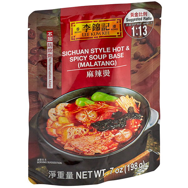 A package of Lee Kum Kee Sichuan-Style Hot and Spicy Soup Base in a bowl of soup.