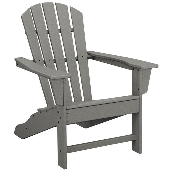 A POLYWOOD slate grey Adirondack chair with armrests.