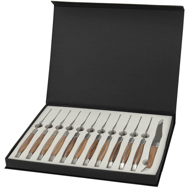 A set of Bon Chef Laguiole steak knives with natural wood handles in a black box.