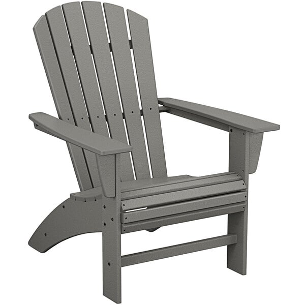A POLYWOOD slate grey Adirondack chair with armrests.