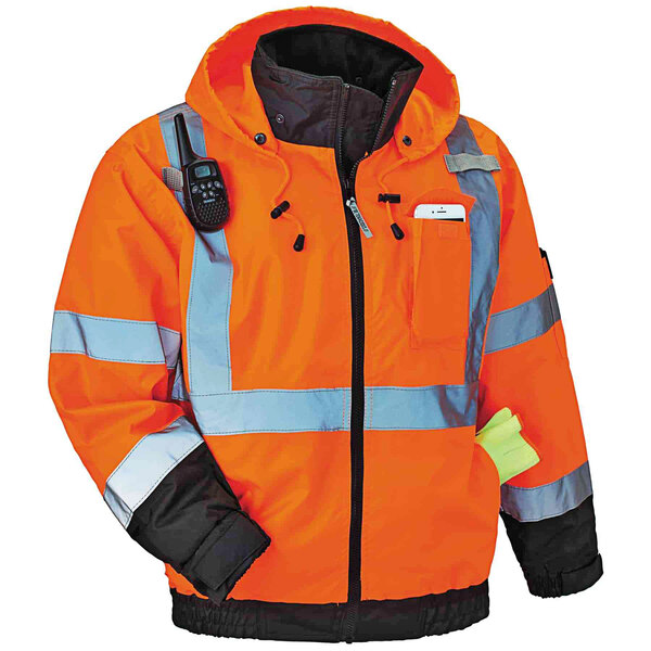 An orange Ergodyne safety jacket with reflective tape on the pockets.