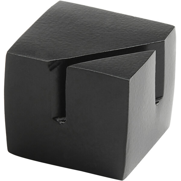 a black cube with a cut out part