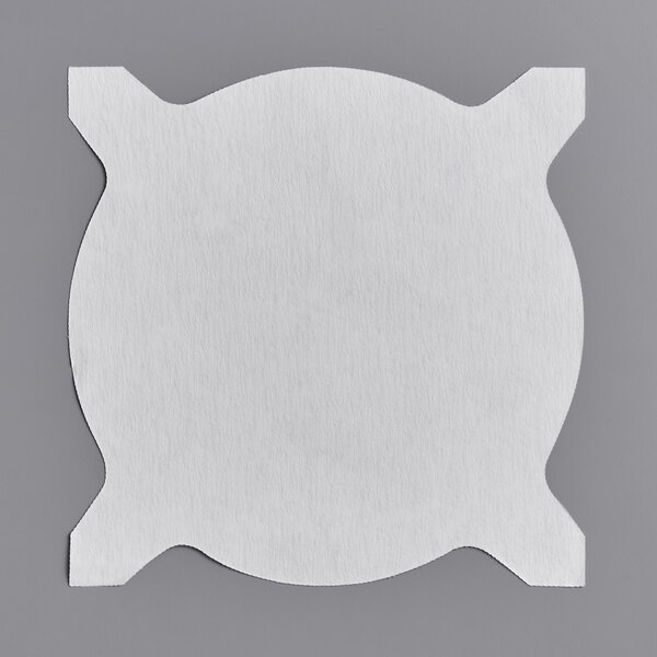 A white paper disc with a circle cut out in the center.