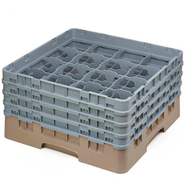 A beige plastic Cambro glass rack with 16 compartments and 4 extenders.