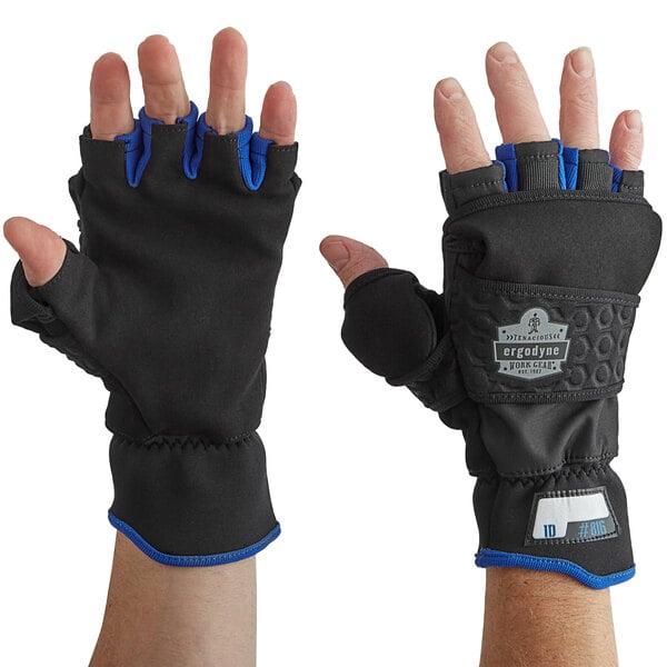 A pair of small blue and black Ergodyne ProFlex thermal fingerless work gloves with blue wrists.