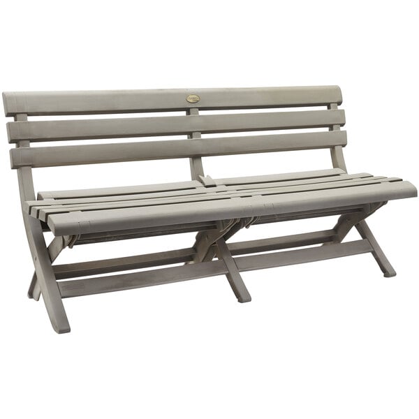 A grey Grosfillex faux wood bench with a back rest and two seats.