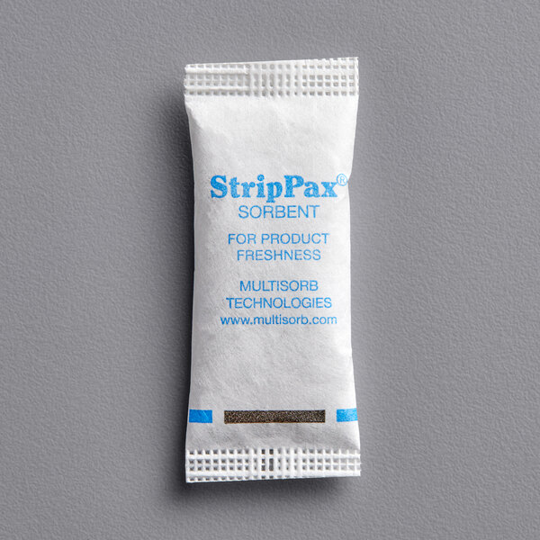 A white Multisorb StripPax desiccant packet with blue text.