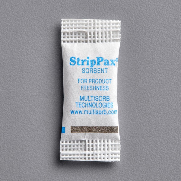 A white Multisorb silica packet with blue text.