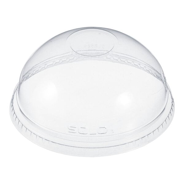A clear plastic dome lid for a Dart plastic cup.