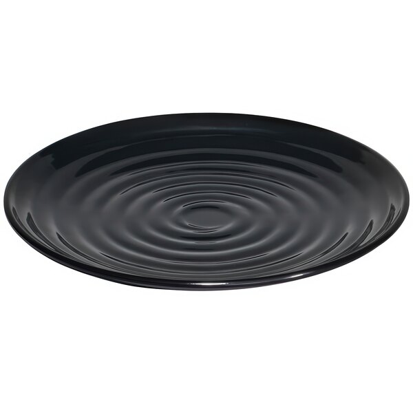 A black GET Milano melamine plate with ripples.