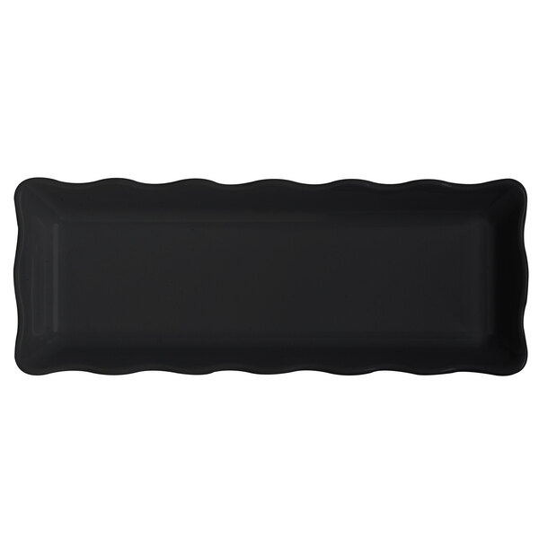 A black rectangular tray with wavy edges.