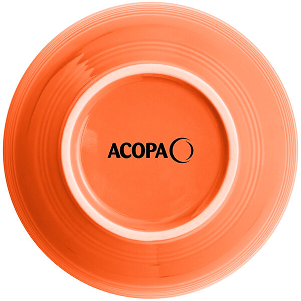 An Acopa Valencia Orange stoneware bowl with black text on it.