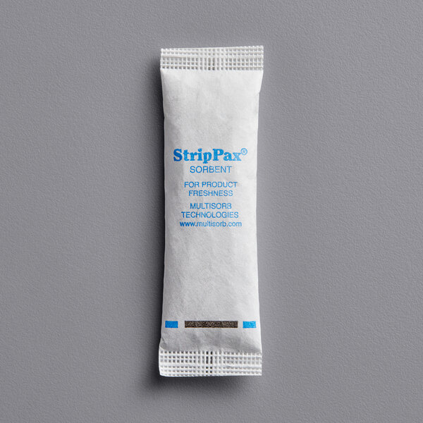 A white Multisorb StripPax desiccant packet with blue text.
