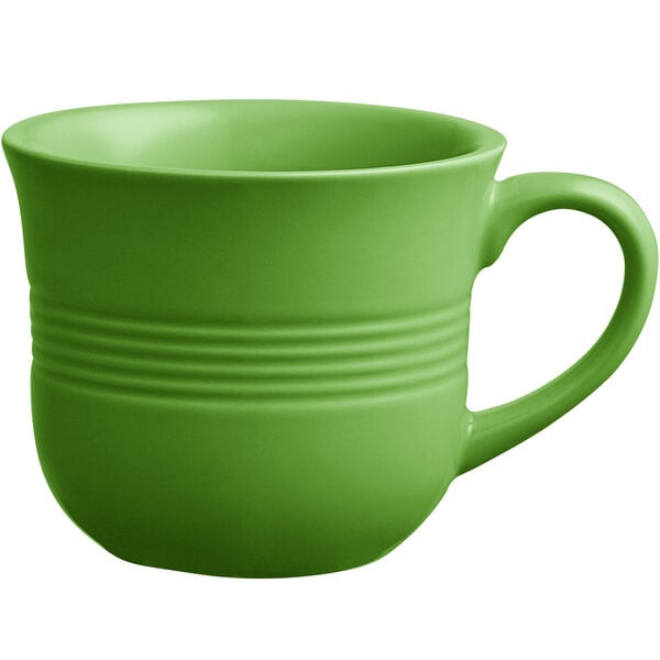 An Acopa Capri palm green stoneware cup with a handle on a white background.