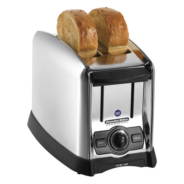 A Proctor Silex commercial toaster with two slices of bread inside.