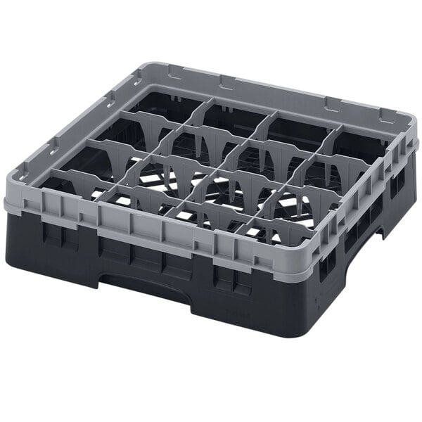 A black and grey plastic Cambro glass rack with 16 compartments.