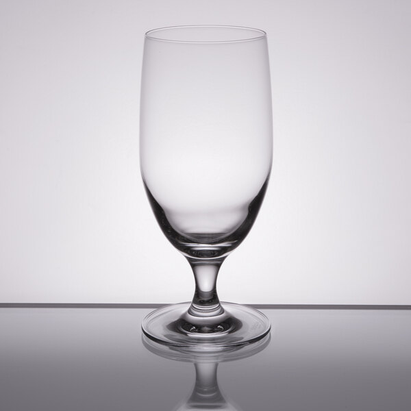 A Stolzle Nadine goblet on a reflective surface.