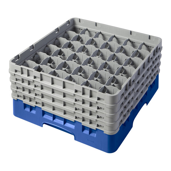 A blue plastic Cambro glass rack with grey extenders.
