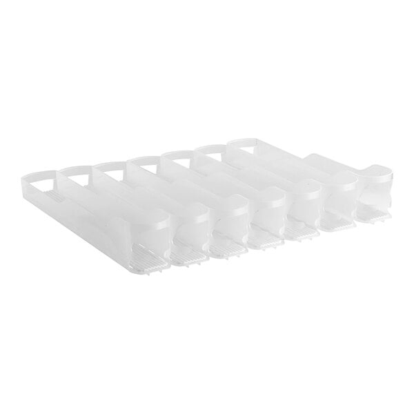 A clear plastic Trueflex bottle organizer with seven lanes.