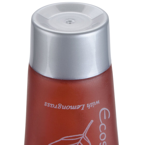 An Ecossential Naturals Hotel and Motel Body Wash 0.5 oz. bottle with a leaf on the label and a white cap.