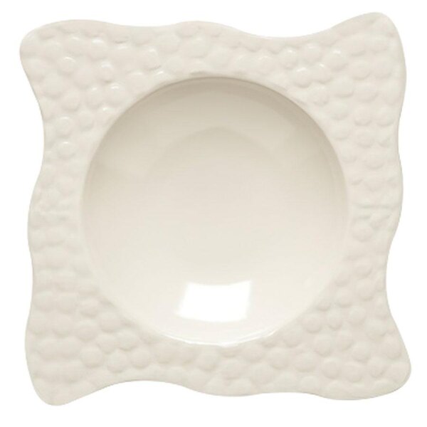 An ivory melamine bowl with a wavy design.