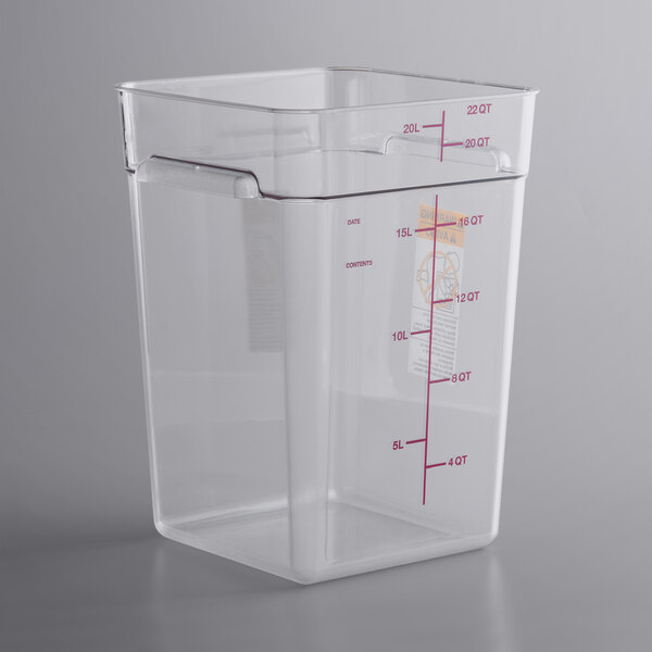 A clear plastic Vigor food storage container with red writing.