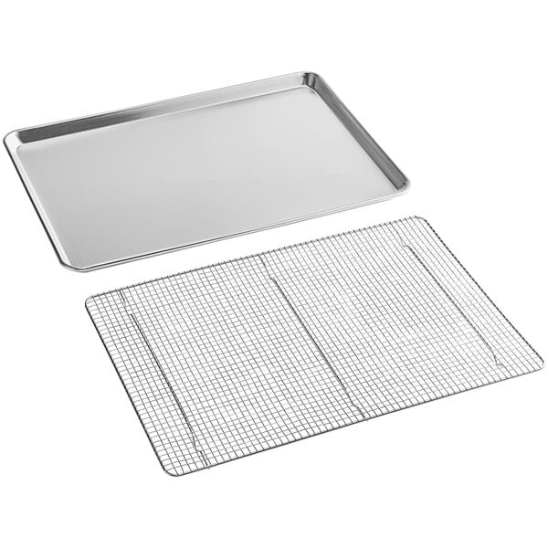 A Baker's Mark aluminum sheet pan with a stainless steel cooling rack on a metal surface.